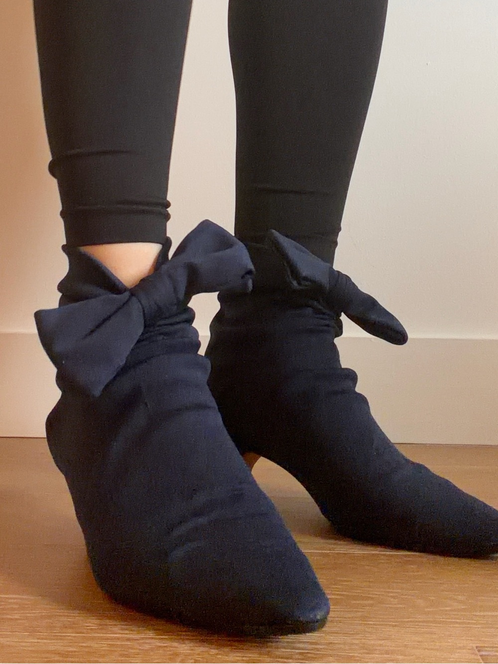 Dolce & Gabbana Dark Blue Pointed-Toe Heels with Decorative Bow worn